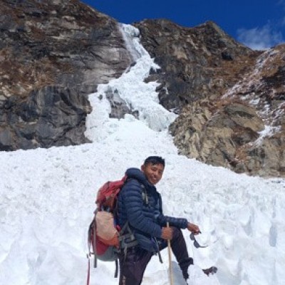 A trekker enjoy on snow during Kanchenjunga trekking